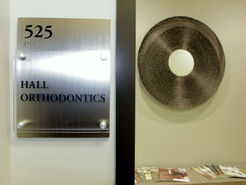Hall Orthodontics sign outside of door