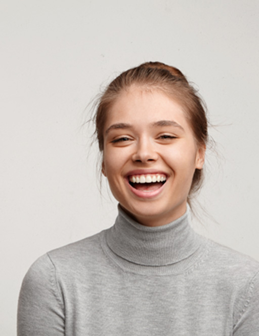 Portrait of happy, smiling young woman