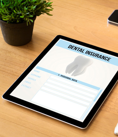 Dental insurance information displayed one electronic tablet
