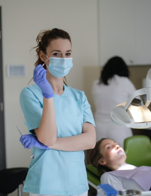 Man and woman looking at laptop for orthodontist reviews in Houston